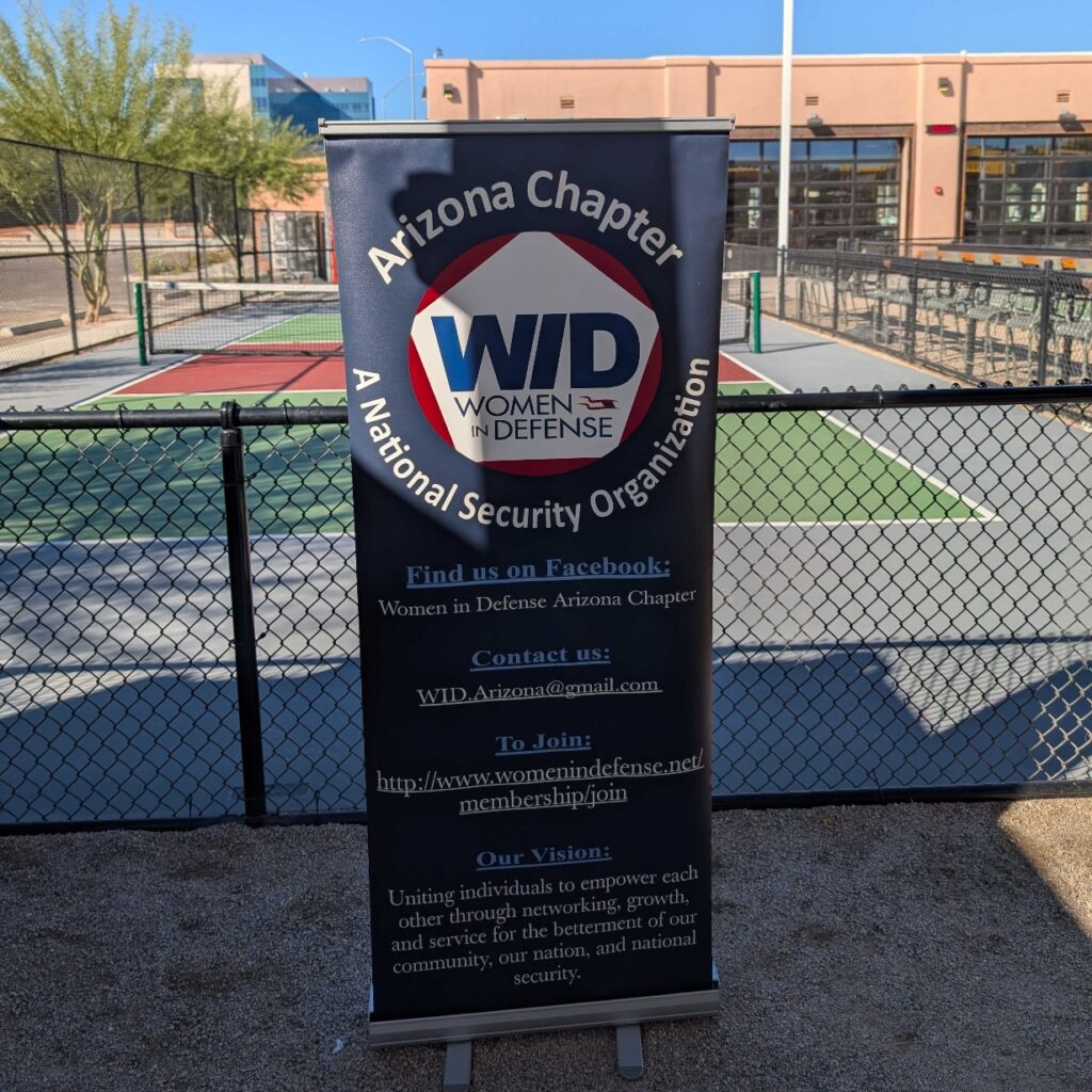 The WID Arizona banner outside of a pickleball court