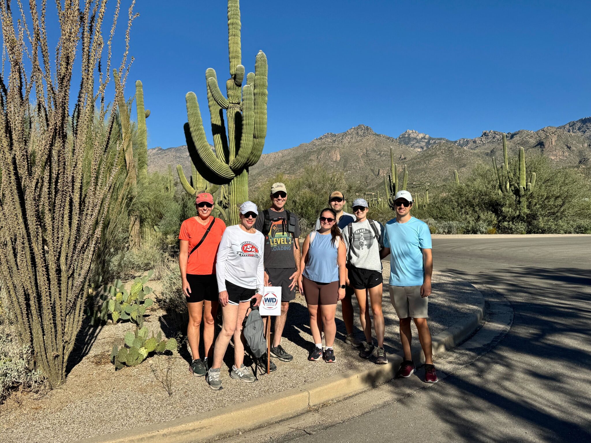 Women in Defense Arizona members hiking and networking in Sabino Canyon Recreation Area.